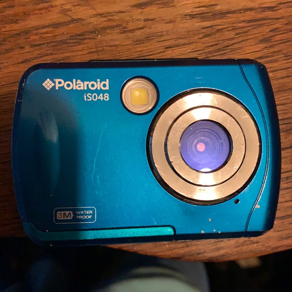 A blue Polaroid iS048